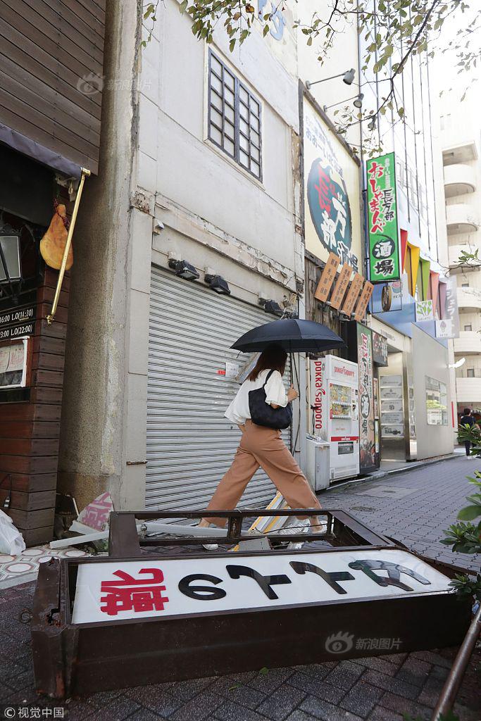 日本台风最新动态与小巷风情小店探访